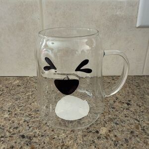 Clear plastic Mug with Black and White Face Design